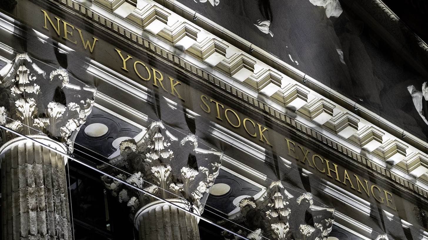 The facade of the New York Stock Exchange at night